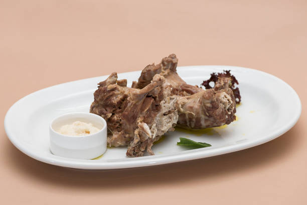 istock Turkey necks,  served with horseradish puree,  placed on white plate,  light background,  isolated 1076502618