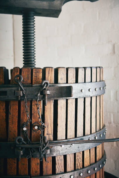 istock Grape press at wine farm in cropped view 1076506276