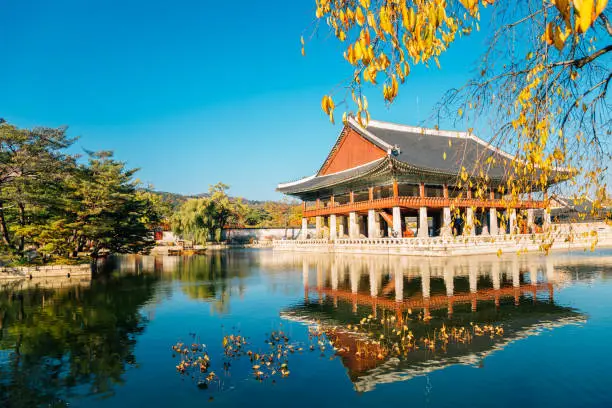 Gyeongbokgung Palace Gyeonghoeru with pond at autumn in Seoul, Korea