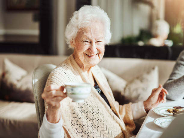 May your tea parties never end Portrait of happy senior women having tea together at a retirement home never stock pictures, royalty-free photos & images