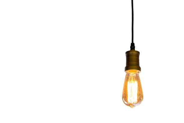 Vintage light bulb hanging isolated white background, Idea concept.with clipping path Vintage light bulb hanging isolated white background, Idea concept.with clipping path light bulb filament photos stock pictures, royalty-free photos & images