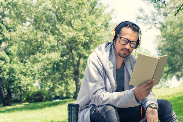 istock Music and book at the park! 1076511562
