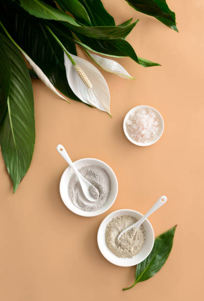 Spa background with cosmetic clays Spa background with natural cosmetic mineral clays and sea salt, view from above face-angles stock pictures, royalty-free photos & images