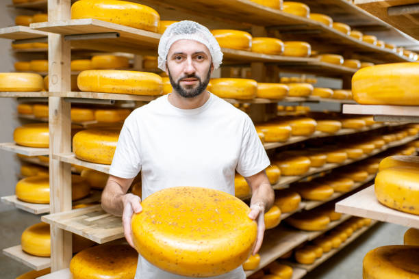 istock Cheese maker at the cheese storage 1076514750