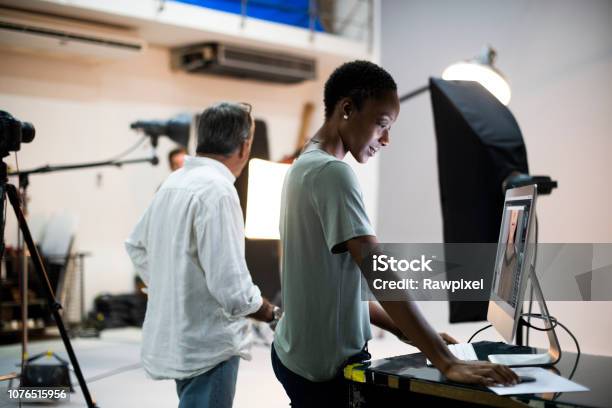 Artists Working In A Studio Stock Photo - Download Image Now - Film Crew, Film Director, African-American Ethnicity