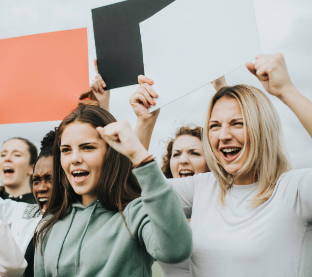 istock Group of angry female activists is protesting 1076516288