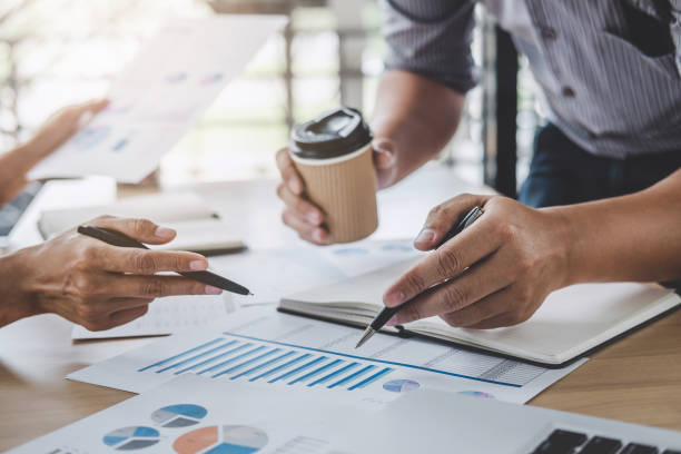 istock Business team meeting working with new startup project, discussion and analysis data the charts and graphs, laptop using, Business finances and accounting concept 1076517622