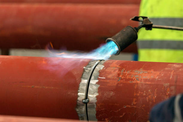 istock Preheating. It involves heating the base metal either in its entirety or just the region surrounding the joint to a specific desired temperature, called the preheat temperature, prior to welding. 1076518590