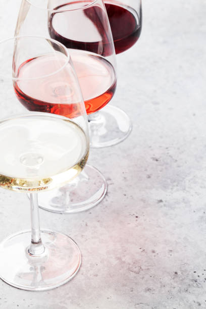 istock Red, rose and white wine glasses 1076519106
