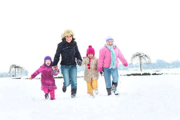 istock Happy family enjoying in winter 1076519152