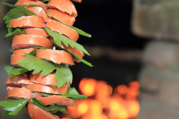 prepare bradwurst with green grocery for barbecue