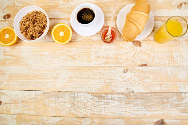 istock Good morning. Continental breakfast on ristic wooden background. 1076526486