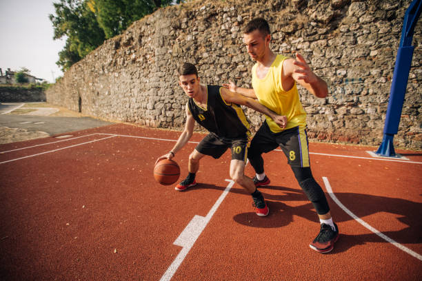 istock Two streetball players 1076526894