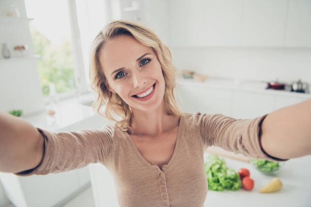 istock Cute nice nice-looking good-dressed curly wavy lady with her per 1076527544