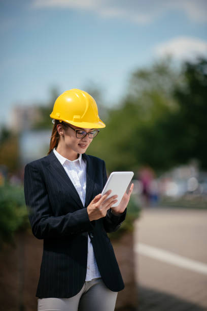 istock Young female architect outdoors 1076529676