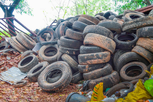 Pile used tires for recycling stock photo