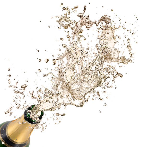 Bottle of champagne, New year 2019 celebration theme. Bottle of champagne with splashing liquid, New year 2019 celebration theme. squirting stock pictures, royalty-free photos & images