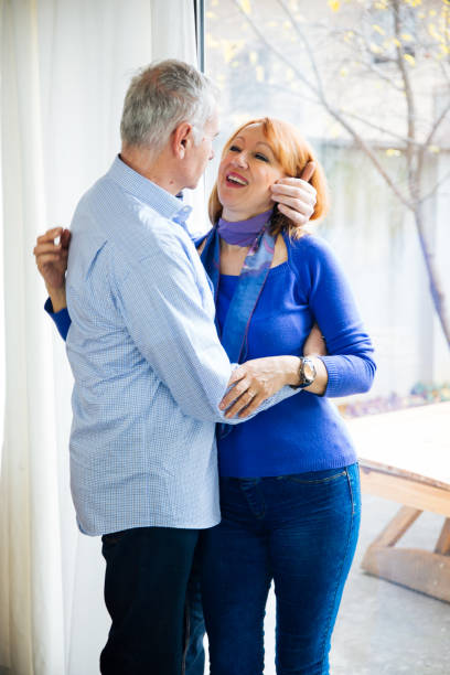 istock Happy mid aged couple enjoying the romance 1076532428