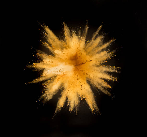 istock Golden powder explosion on black background. 1076532684