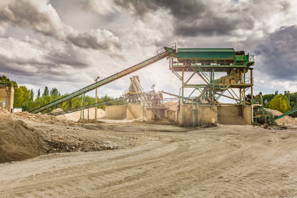 istock Excavator collecting stone in an open-cast mine 1076535726