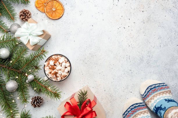 Christmas background with fir tree, hot chocolate, gift box
