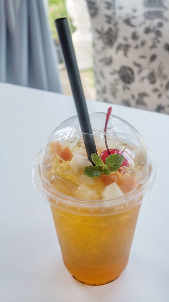 istock cocktail with fresh sliced fruits 1076544364