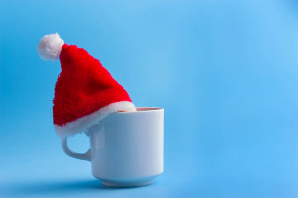 istock santa hat on a cup of coffee 1076547756
