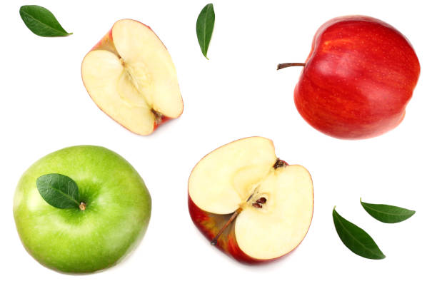 istock green and red apples with slices isolated on white background. top view 1076562024