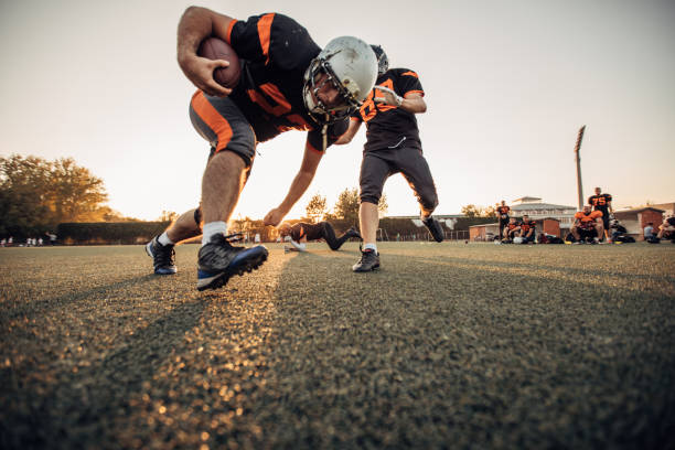 istock Football match outdoors 1076565478