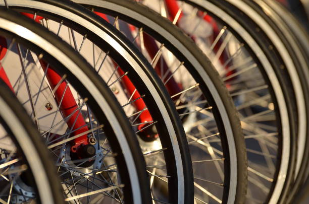 istock Row of bicycle wheels, closeup. 1076571104