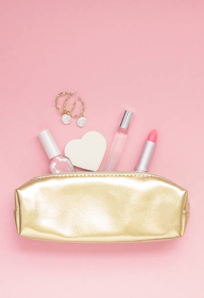 istock Golden female purse with cosmetics 1076578808