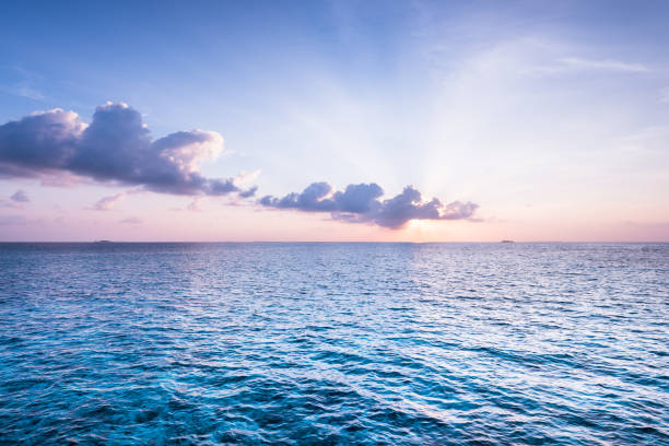 istock Gentle impressive ocean at sunset. Maldives. 1076579660