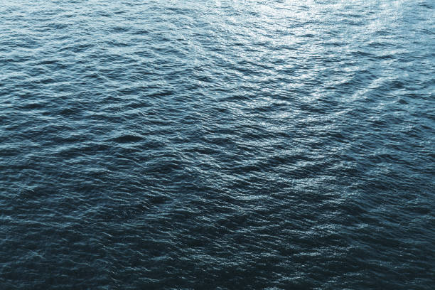 istock Shining surface of Ocean water texture 1076593546