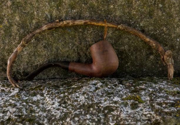istock Gravestone and Pipe of Arthur Doyle 1076594024