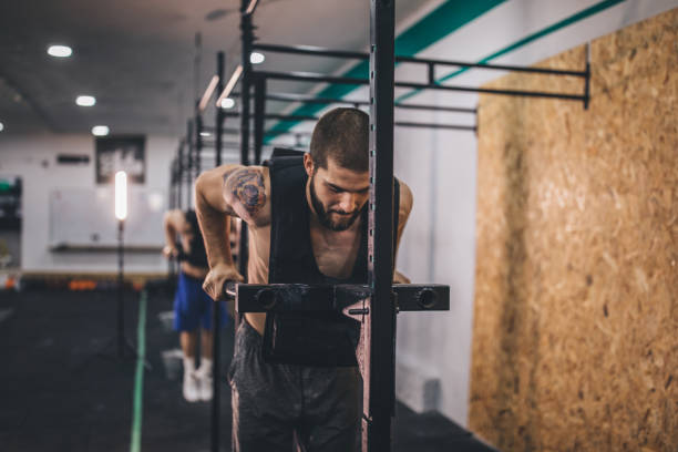 istock Two young guys at the gym 1076594808