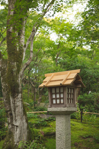 istock japanese wooden lantern in the park 1076595594