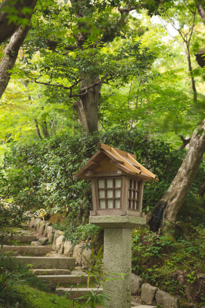 istock japanese wooden lantern in the park 1076595628