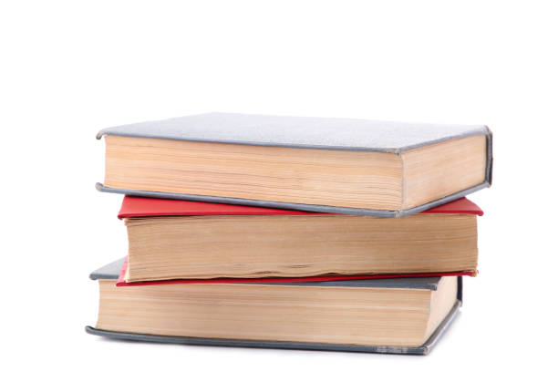 istock Old vintage books isolated on white background 1076595638