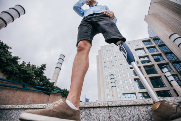 istock Disability businessman in city 1076596380