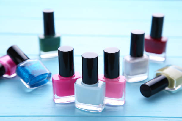 istock Group of bright nail polishes on blue 1076600248
