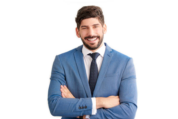 istock Businessman standing at isolated white background and wearing suit 1076603984