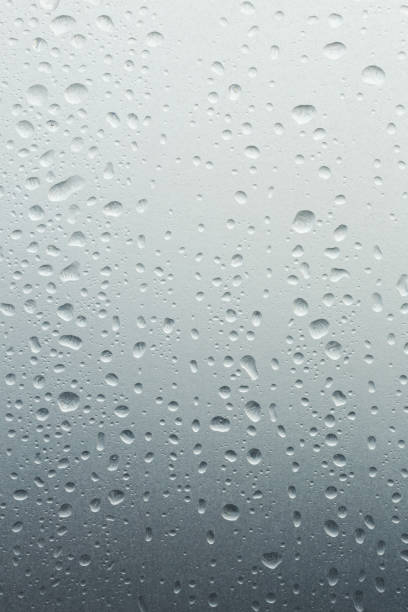 istock Cold weather, raindrops on the glass surface 1076605022