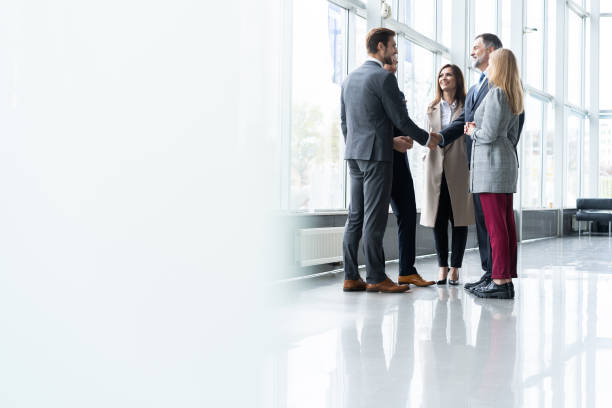 Business people shaking hands, finishing up a meeting. Handshake. Business concept. Business people shaking hands, finishing up a meeting. Handshake. Business concept coalition photos stock pictures, royalty-free photos & images