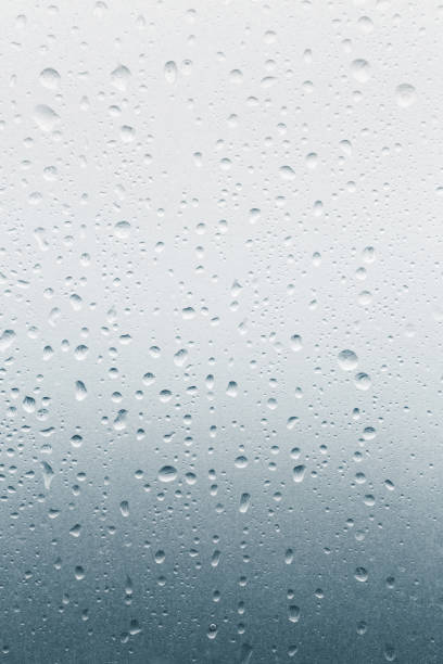 istock Cold weather, raindrops on the glass surface 1076606920