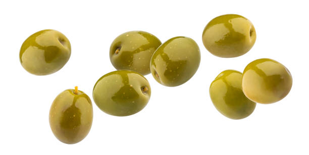 istock Green olives isolated on white background with clipping path 1076617626