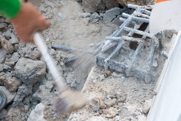 istock Building worker hitting with sledge hammer. Home repair concept 1076620768