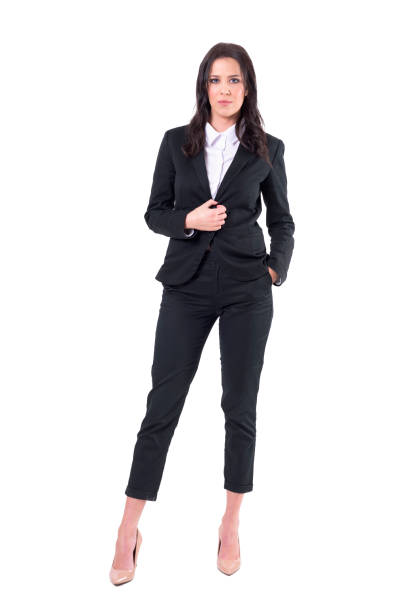 istock Elegant female corporate manager in business suit posing and holding button 1076628310
