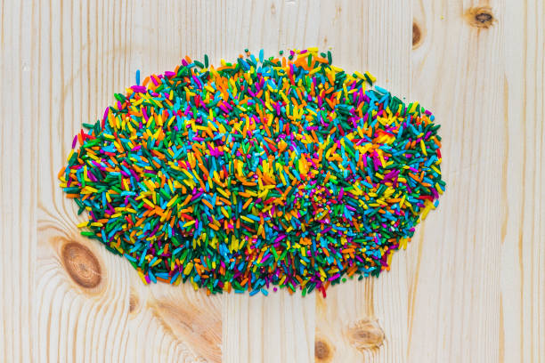 istock colorful rice on wooden background 1076630850