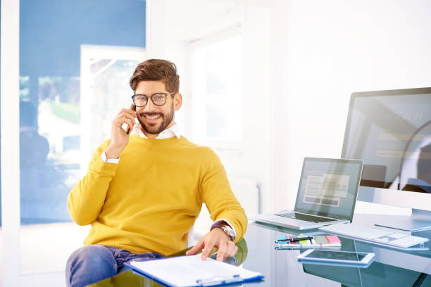 istock Businessman using mobile phone in the office and talking with somebody 1076632506