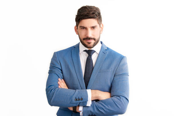 istock Confident young businessman wearing suit while standing at isolated background 1076632558